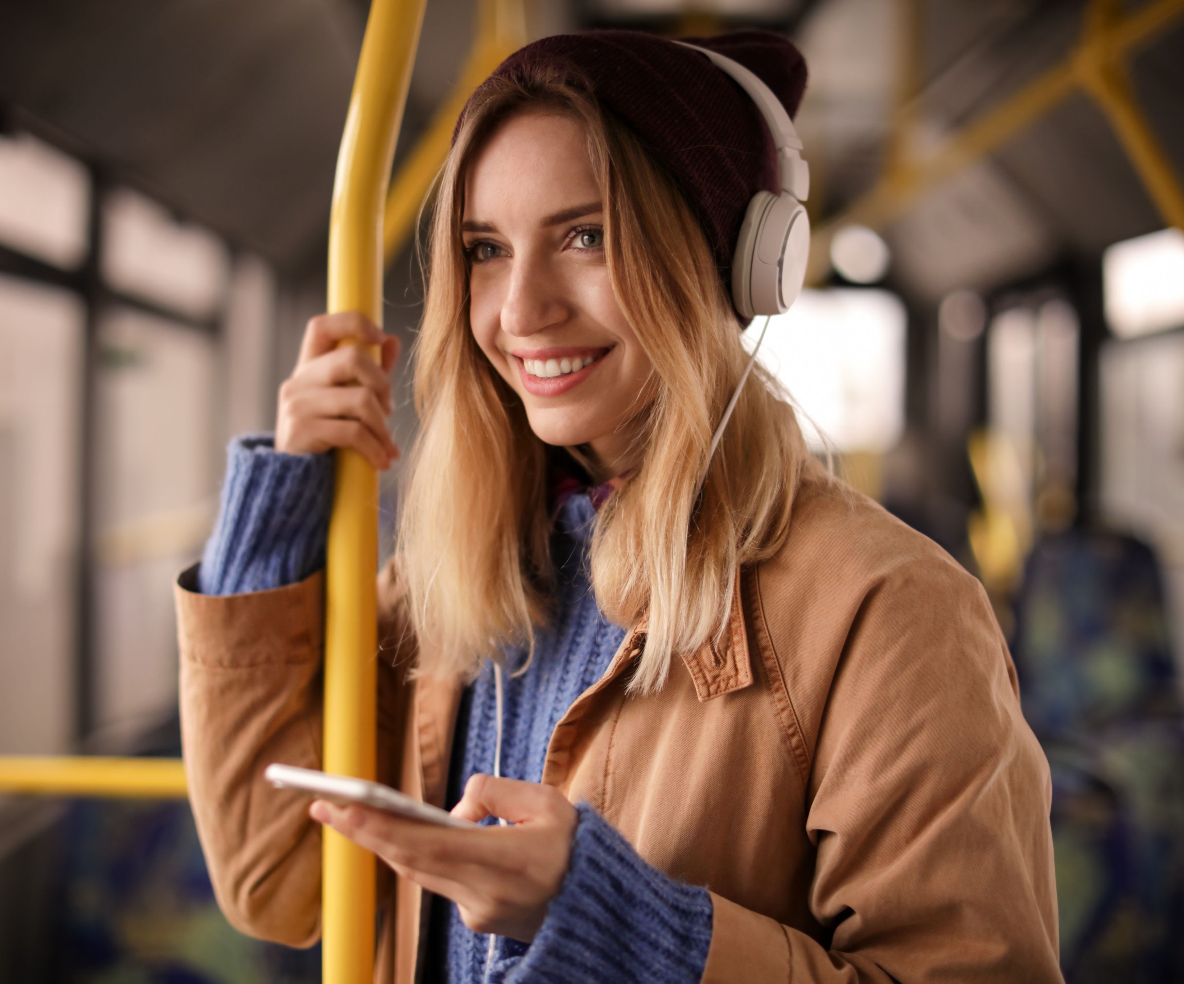 banner, woman in bus smiling